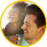 Woman and man smiling after using Sun Life Preferred Pharmacy Network